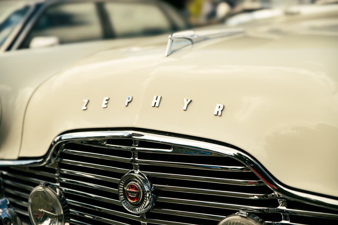 Zephyr lettering and chrome grille on a cream 1950s Ford saloon