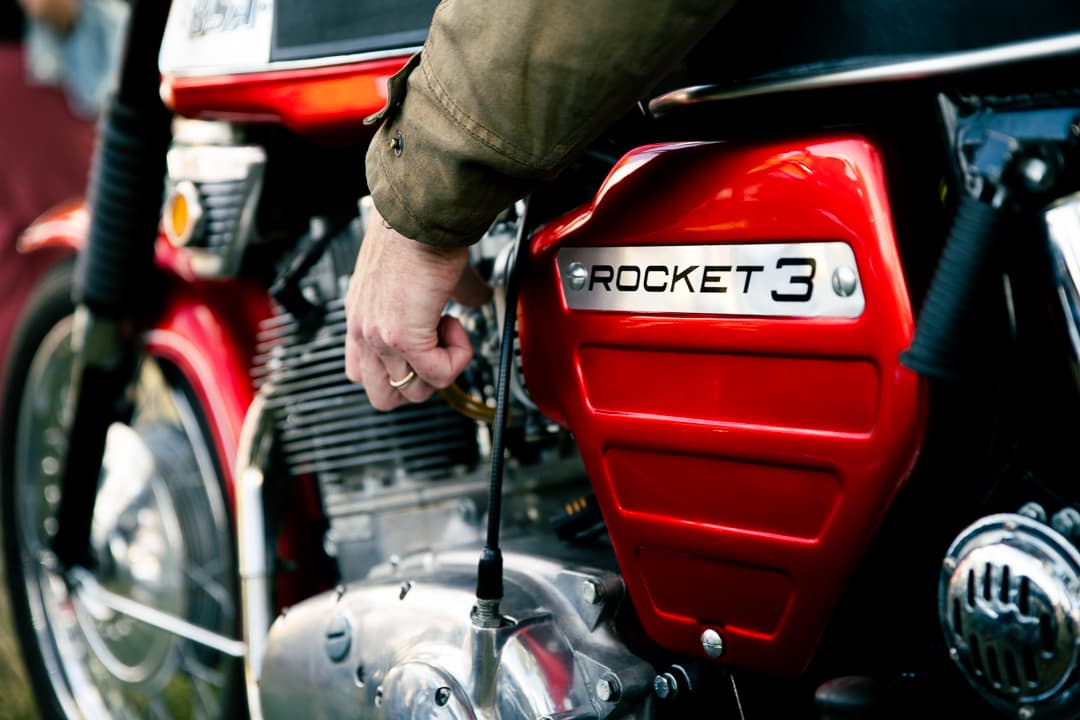 Rocket 3 side panel on a red Triumph motorcycle