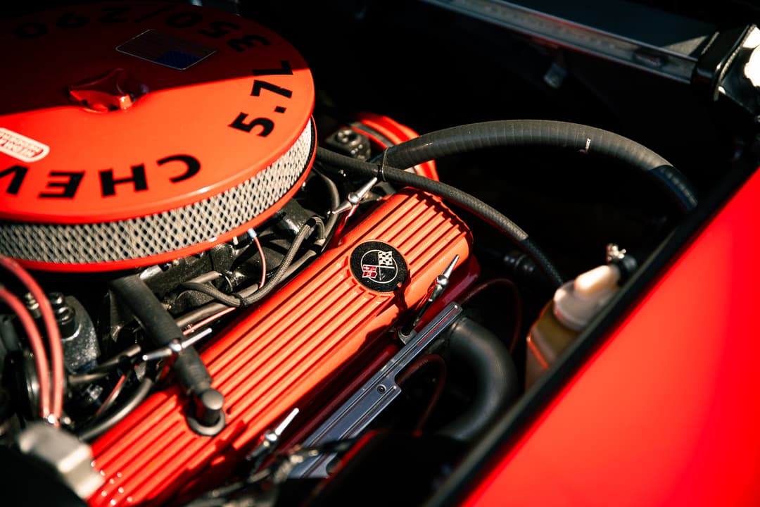Red Chevrolet 5.7 engine with polished rocker covers
