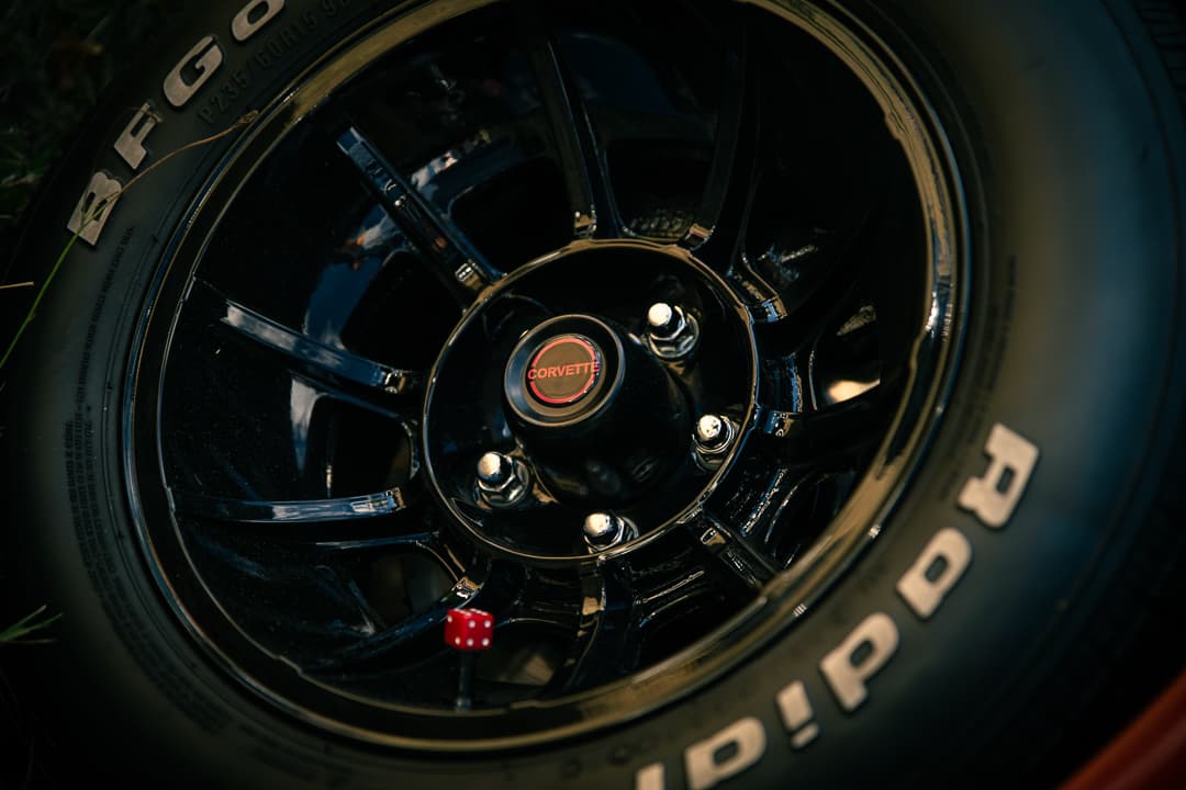 Chrome wheel and BFGoodrich radial tyre with a red dice valve cap