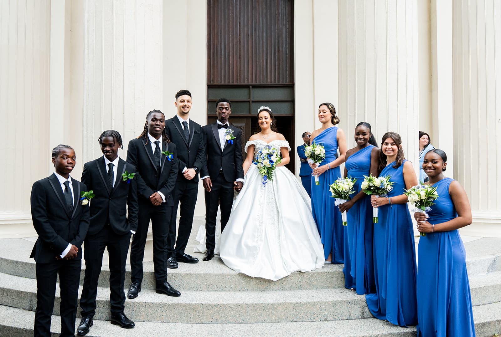 A group photo of a beautiful couple and their closest ones