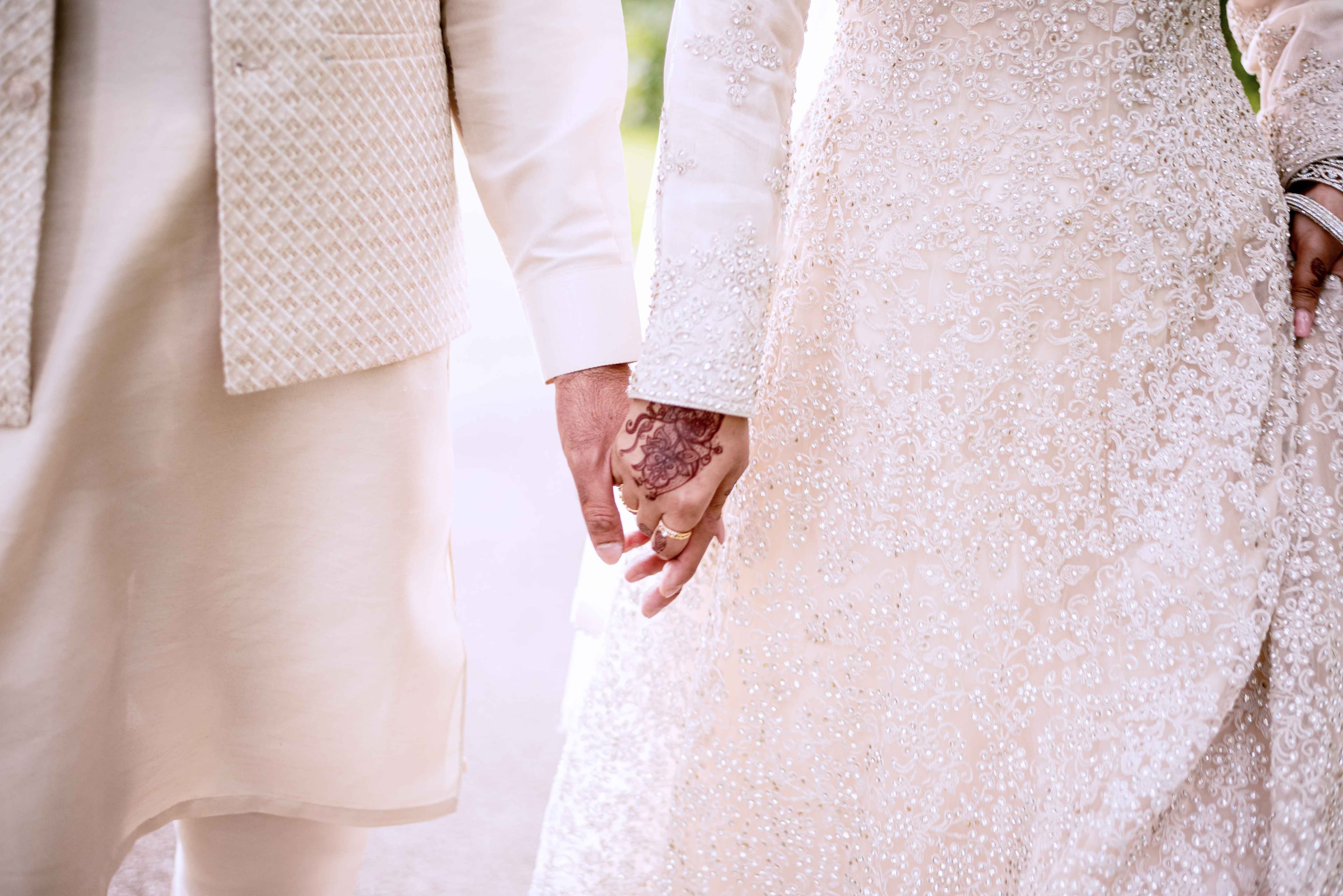 Newlyweds holding hands